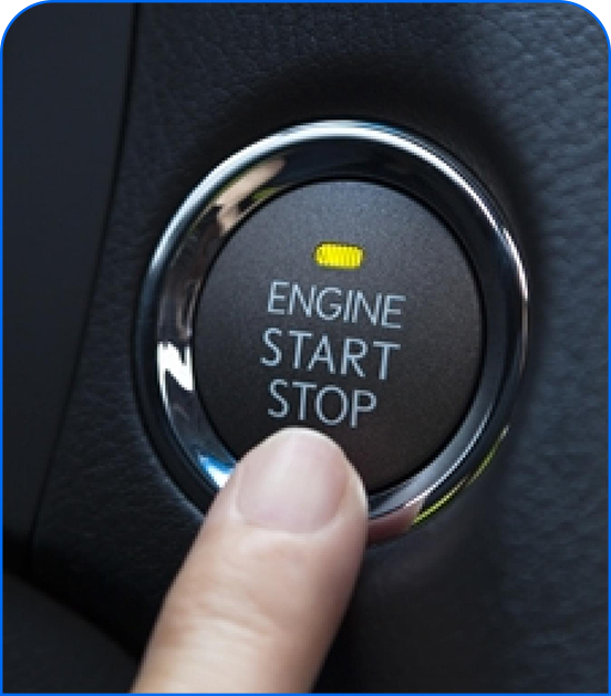 Finger pressing car engine start stop button for keyless ignition system in modern vehicle interior