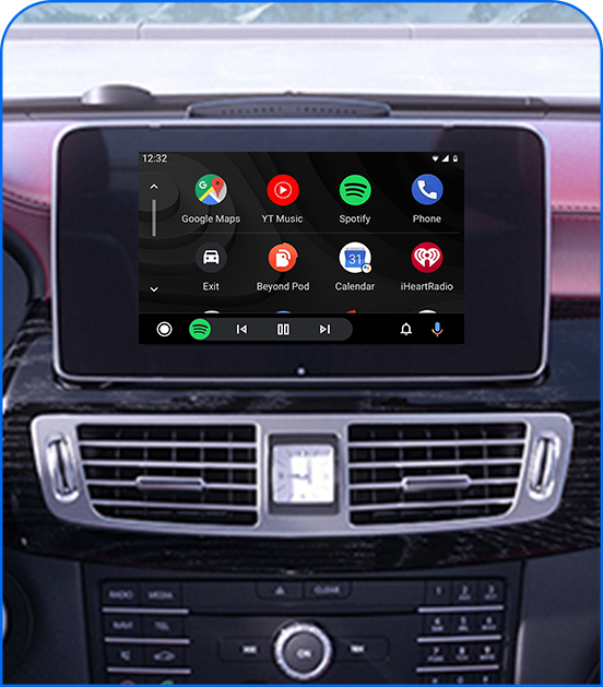 Car dashboard display running Android Auto with Google Maps, Spotify, YouTube Music, Calendar and iHeartRadio apps